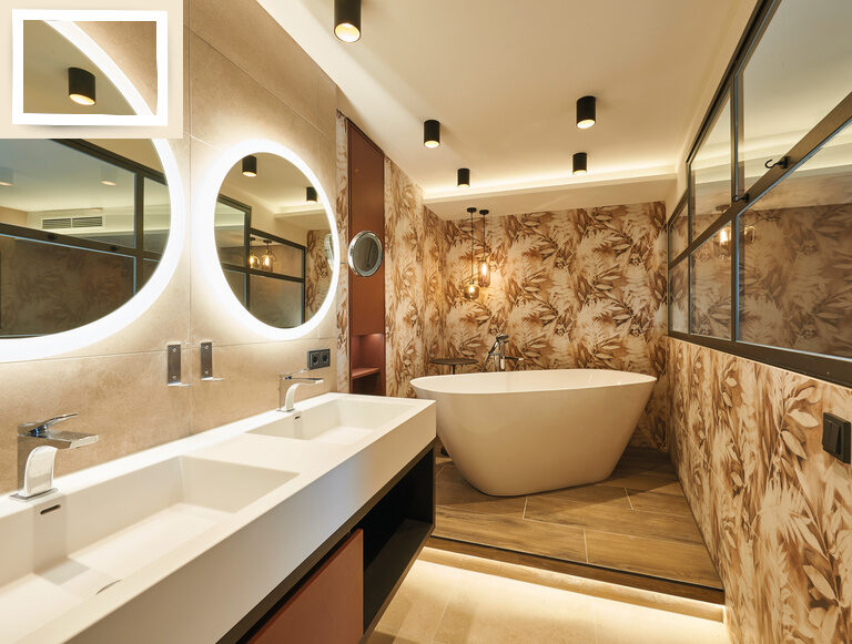 Stilvolles Badezimmer mit großer Badewanne und Waschbecken in der Suite Pink Lady - perfekt für Entspannung im Wellnesshotel Holzapfel, Bad füssing.